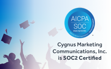 graduates throwing caps in air